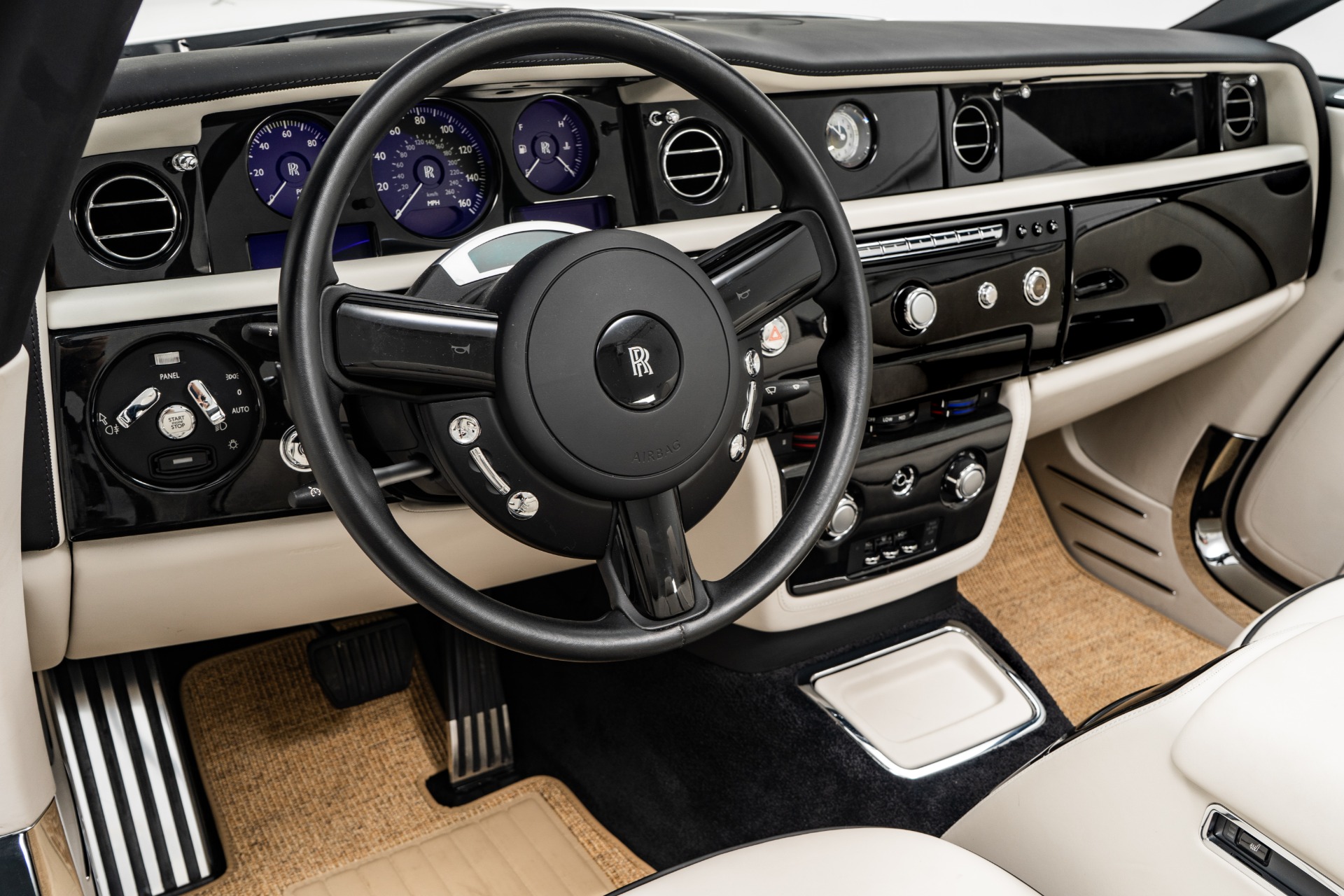 Step inside this modified RollsRoyce Phantom Drophead  Top Gear