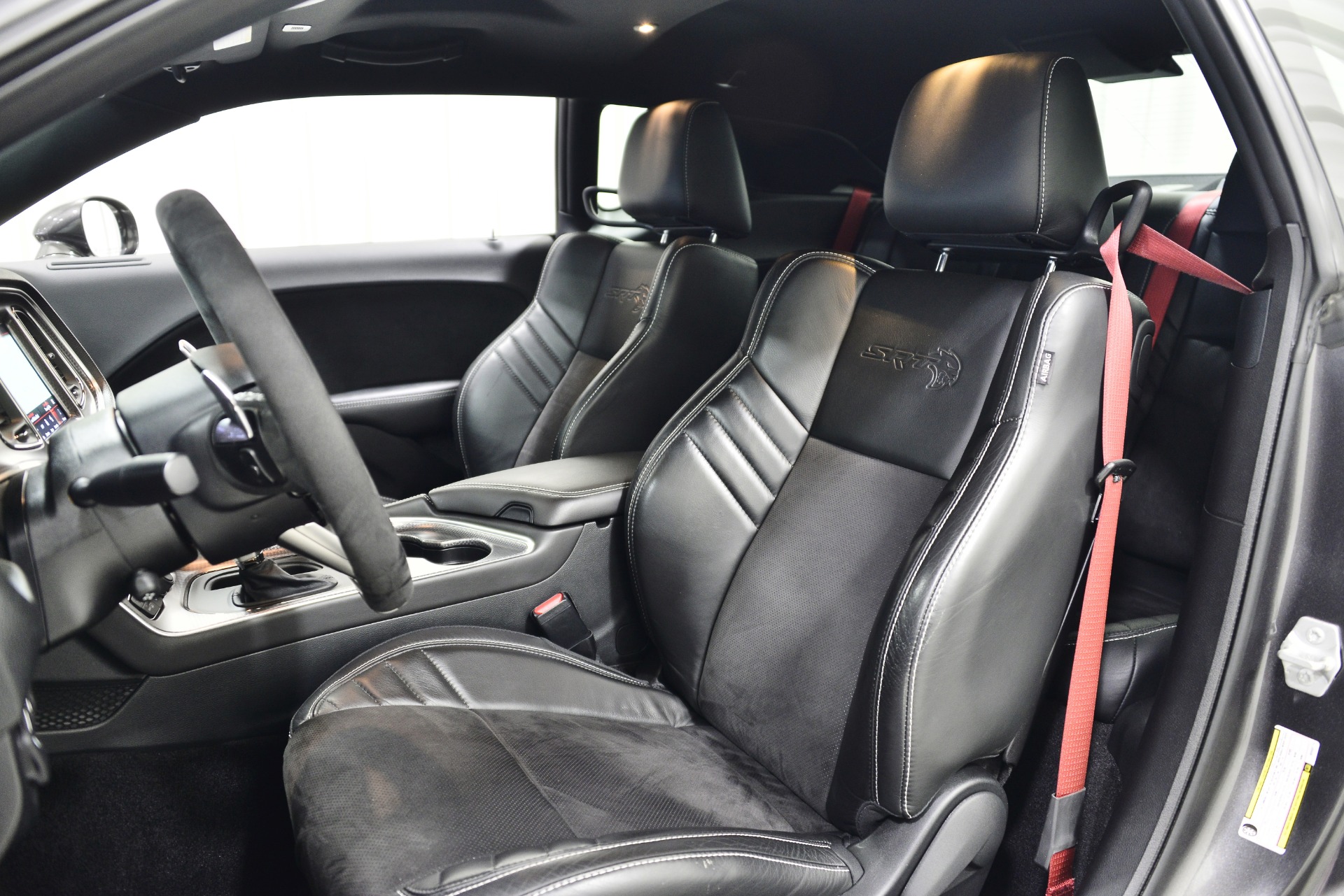 Challenger red deals seat belts